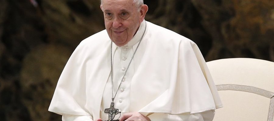Pope Francis is pictured during his general audience in Paul VI hall at the Vatican Oct. 14, 2020. A few days after four Swiss Guards tested positive for COVID-19, the pope broke from his normal pattern and did not personally greet people in the crowd. (CNS photo/Paul Haring)